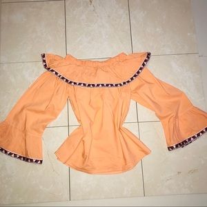 Orange bell sleeve ruffle blouse